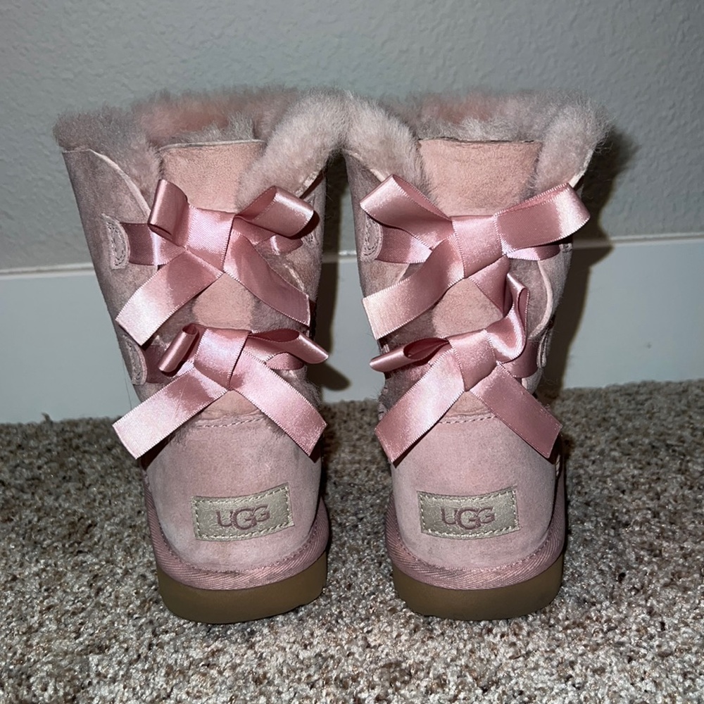 UGGs , size 4, pink with bows